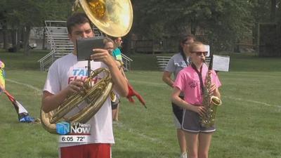 SURVIVING BAND CAMP: How local high school band students are beating the heat