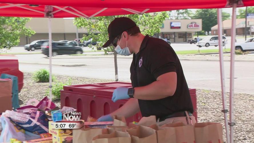 Lima Police Department shows support for graduating seniors with drive-thru cookout