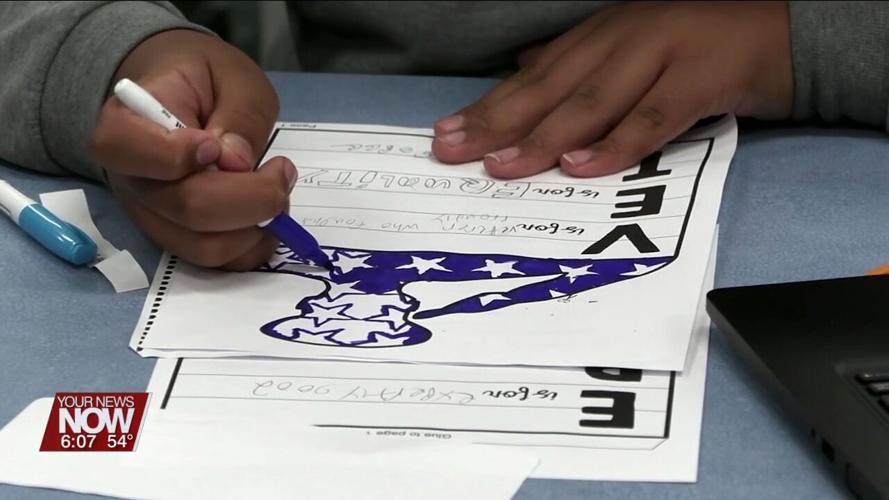 8th graders at Liberty Arts write letters to the veterans going on the Honor Flight
