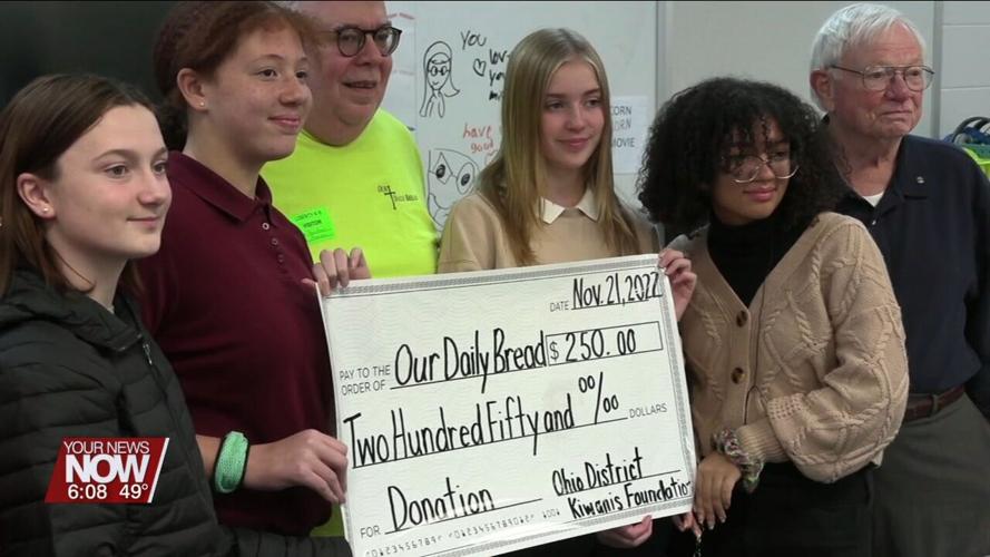 Liberty Arts Magnet School Builders Club and Kiwanis Club makes a donation to Our Daily Bread