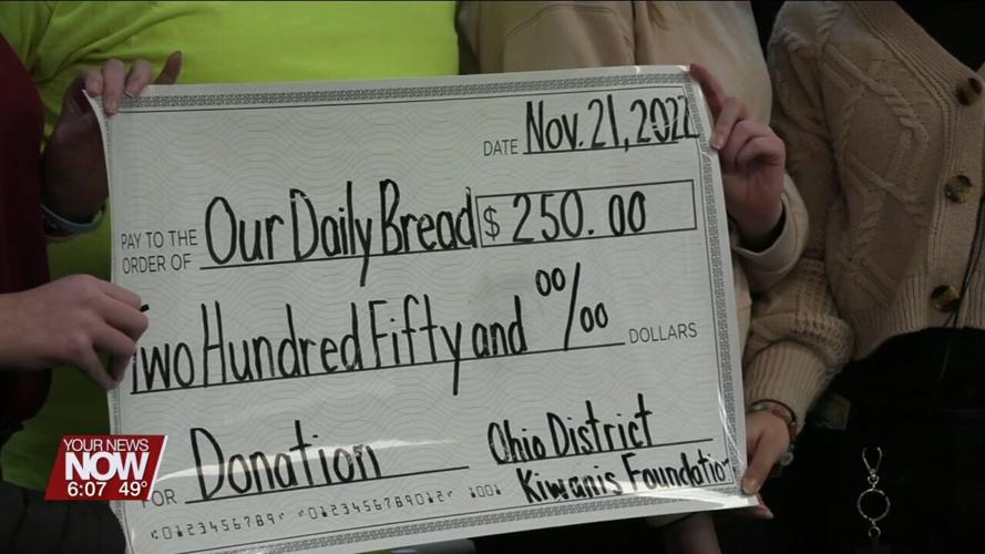 Liberty Arts Magnet School Builders Club and Kiwanis Club makes a donation to Our Daily Bread
