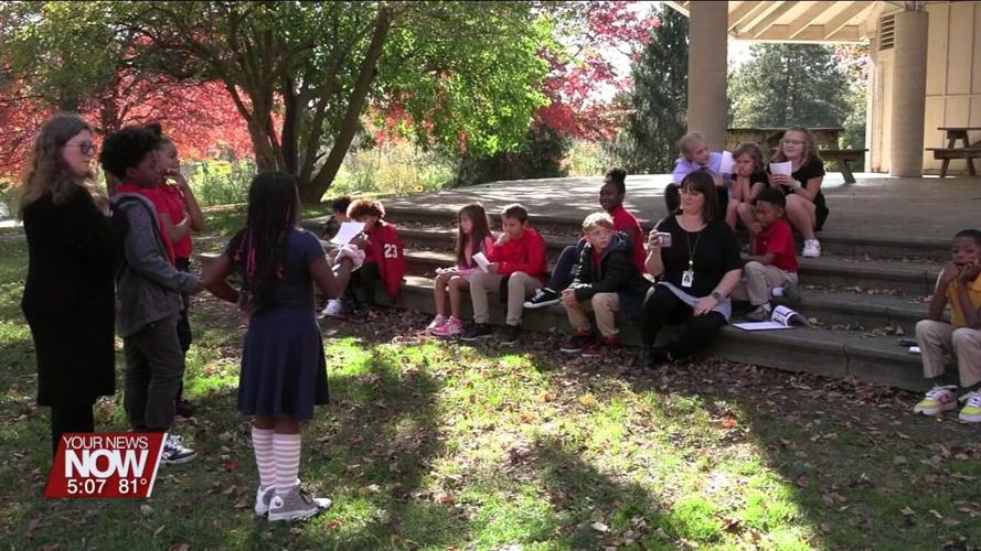 Students perform as famous Ohioans at the Faurot Park pavilion as part of a research project