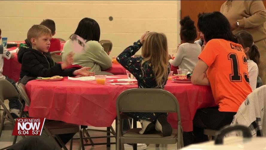 Children dash to the Lima Family YMCA for Breakfast with Santa
