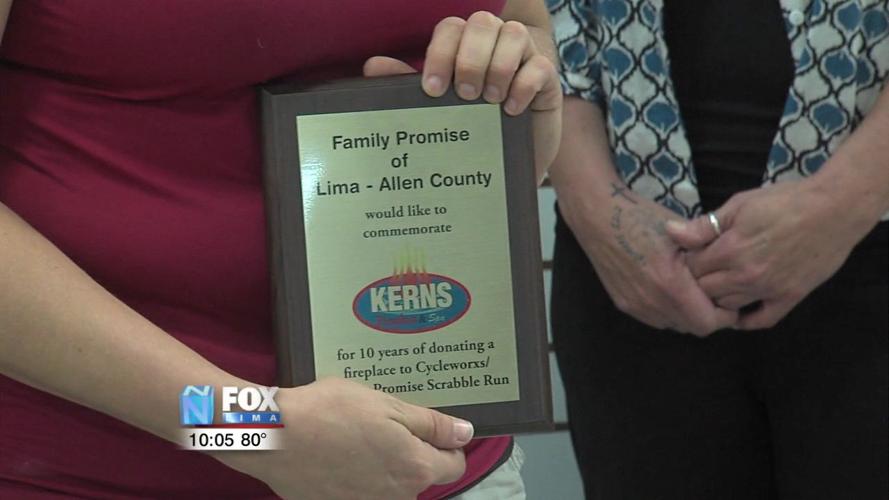 Family Promise accepts money raised at Scrabble Run 2.jpg