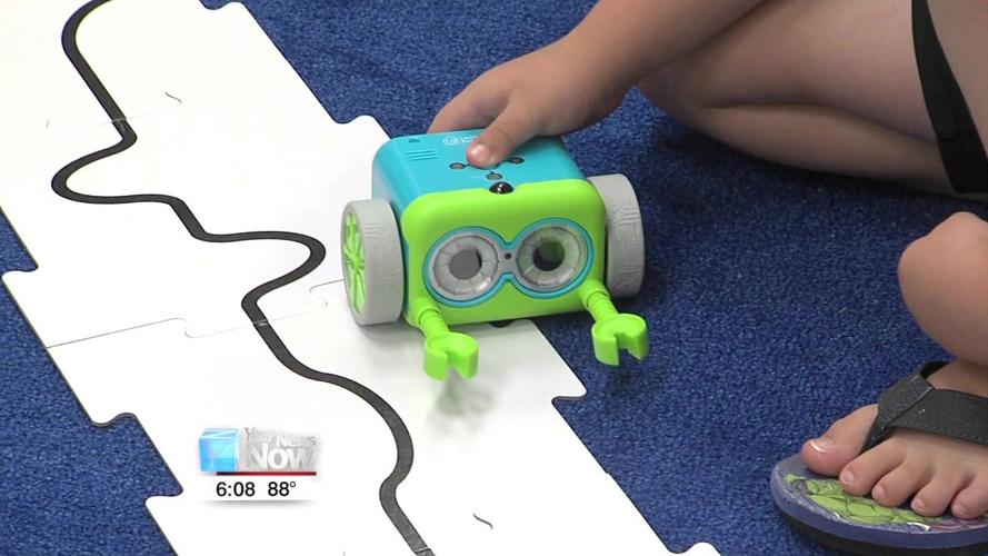 Kids learning in a fun way at the free summer library program 2.jpg