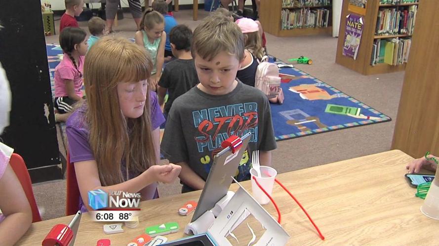 Kids learning in a fun way at the free summer library program 1.jpg