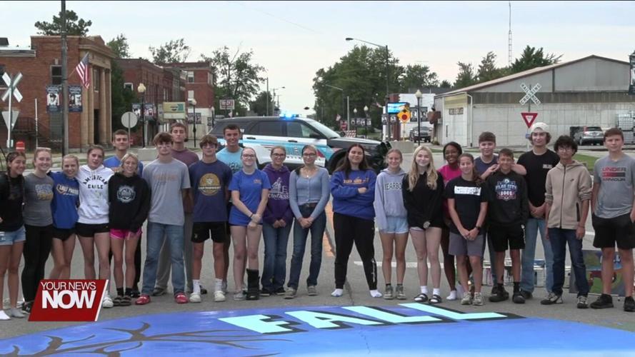 High School Art Club students paint mural on Main Street for annual Continental Fall Festival