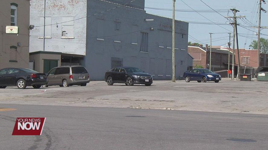 Two people charged, and two officers injured in an incident outside a Lima bar