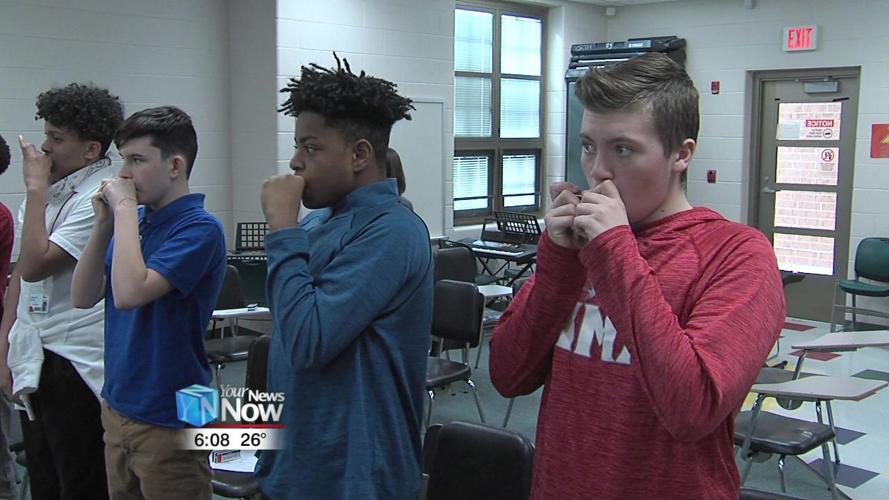 8th graders at Liberty Arts Magnet sing and play harmonica with Blues artist 2.jpg