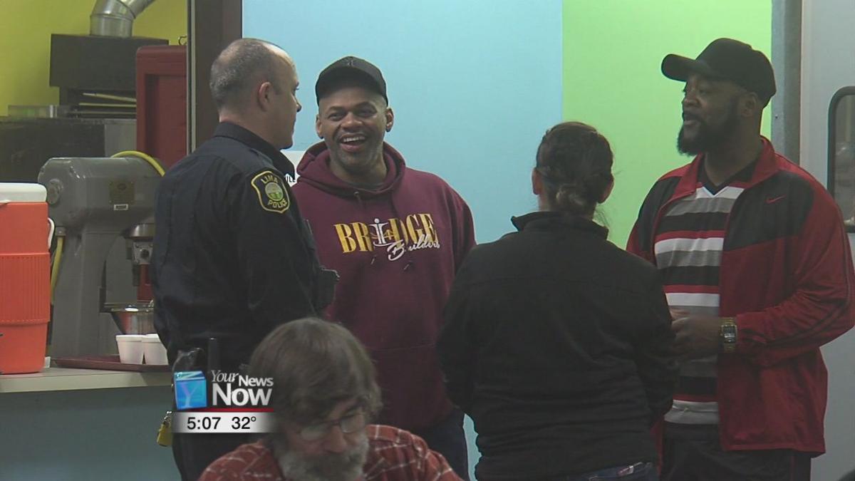 Residents and law enforcement come together for Coffee with a Cop 1.jpg