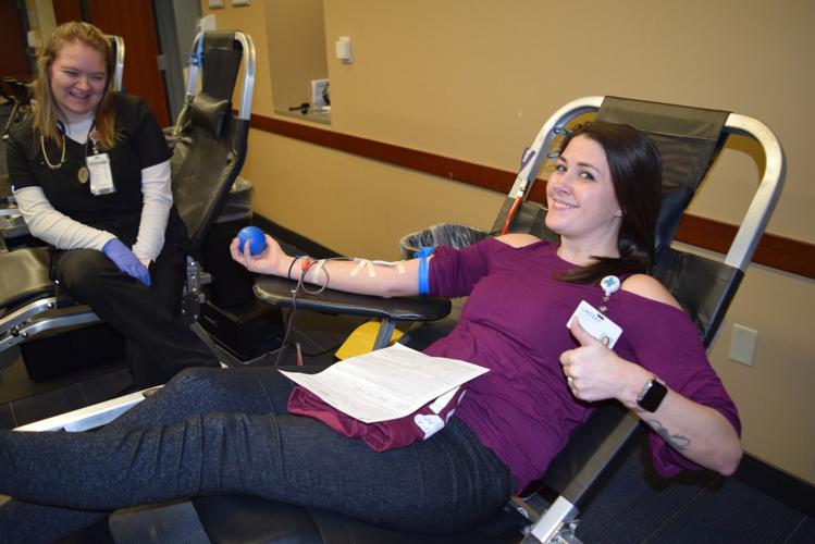 Lindsay Hooks donating
