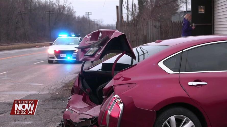 SUV rear ends another vehicle, crashes into backyard and bar