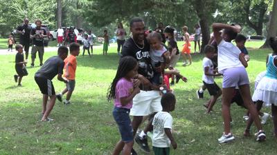 Lima families celebrate fatherhood with day of fun in the park