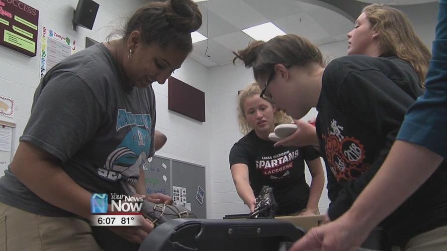 Lima Senior choir collecting shoes to help fund tour trip 2.jpg