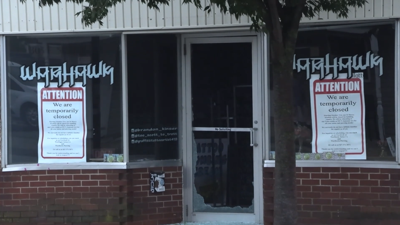 Warhawk Tattoo front signs