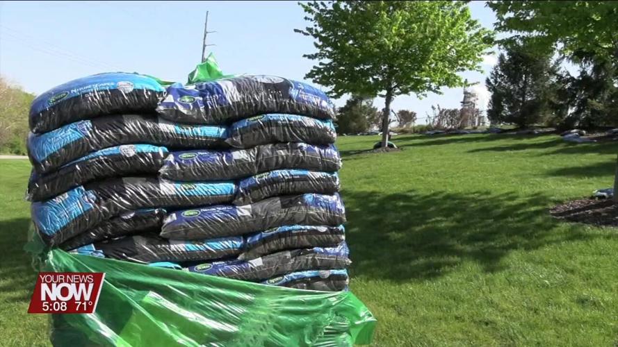 Delphos St. John's students spread mulch at Nutrien after the company purchases 1,100 bags during fundraiser