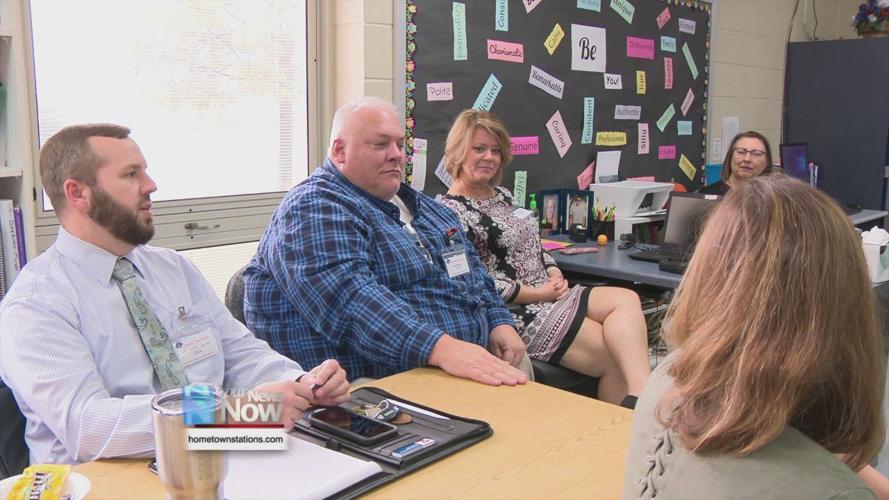Education officials make a literacy school visit in Logan County