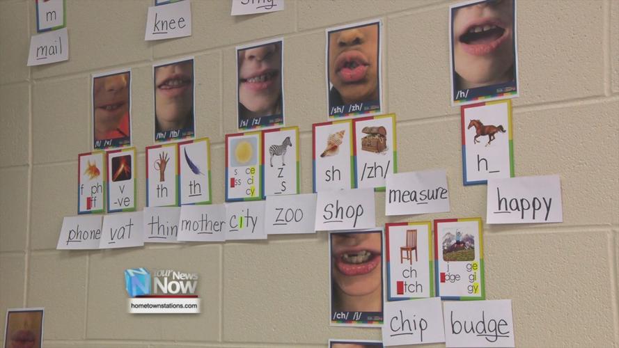 Education officials make a literacy school visit in Logan County