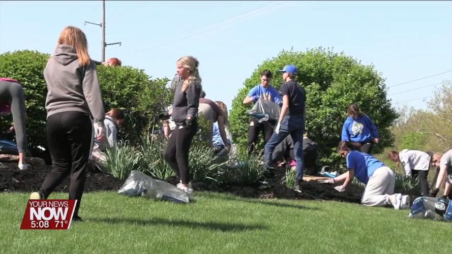 Delphos St. John's students spread mulch at Nutrien after the company purchases 1,100 bags during fundraiser