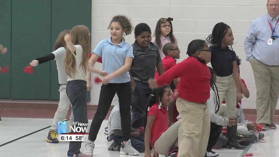 Unity Elementary students get pre-test pump up from Lima West pep leaders 2.jpg