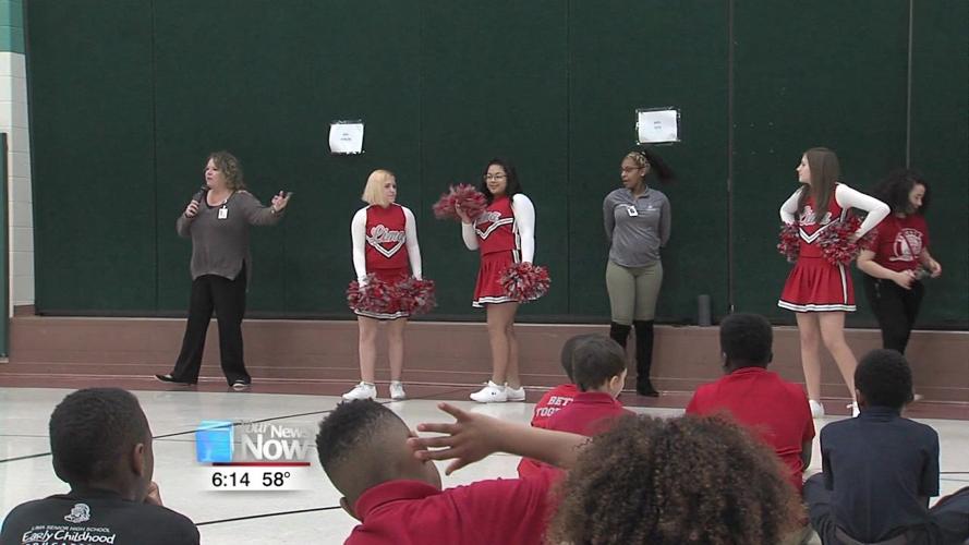 Unity Elementary students get pre-test pump up from Lima West pep leaders 1.jpg