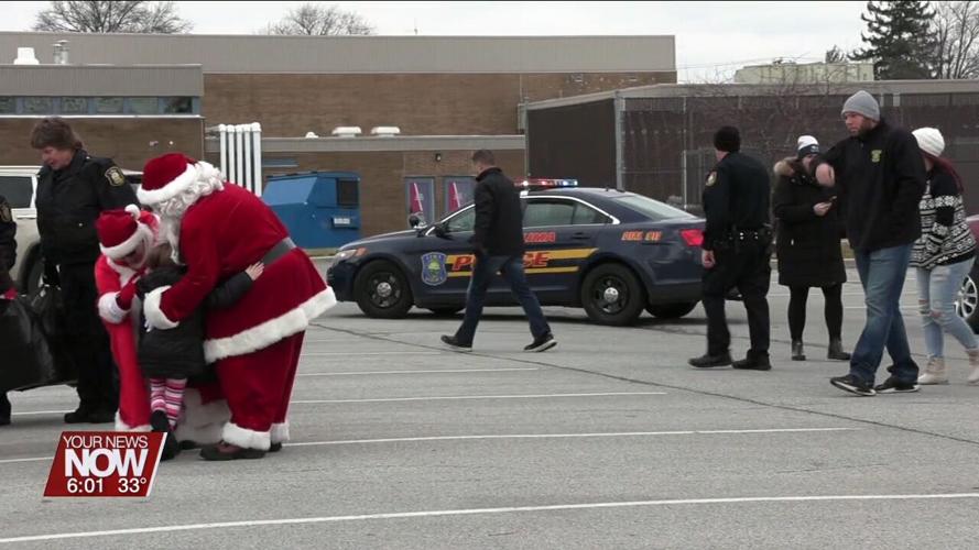 Allen County law enforcement and fire departments deliver Christmas gifts