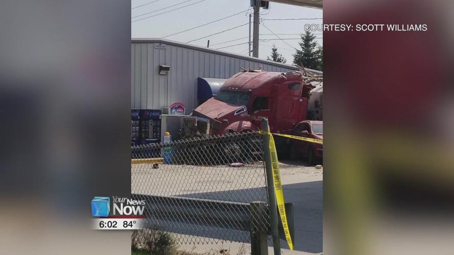 Semi truck drives through a house and crashes into gas station