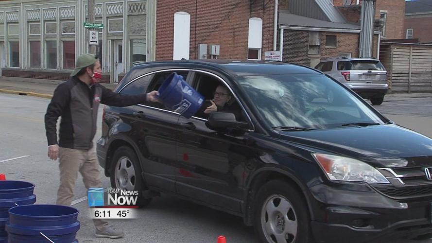 Local businessman distributes Earth Day kits