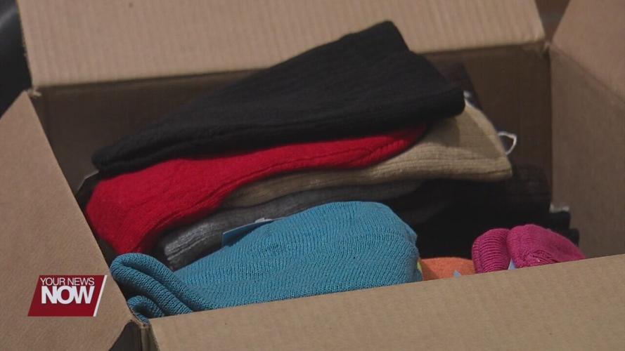 Warm clothing giveaway ensures Lima residents stay warm in time for Christmas