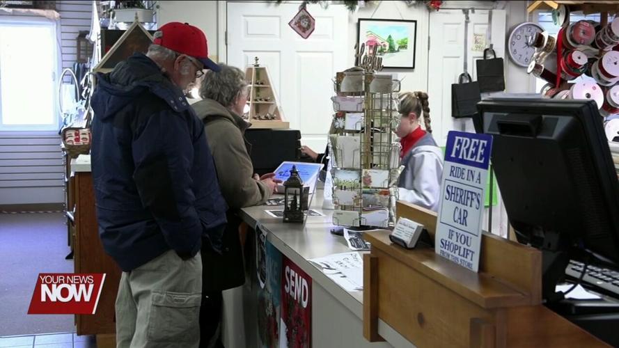 Shoppers in Wapakoneta buying local as part of Small Business Saturday