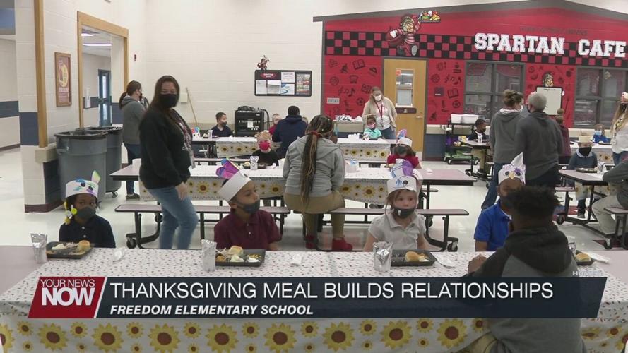 Freedom Elementary Kindergarteners share Thanksgiving meal with school resource officers