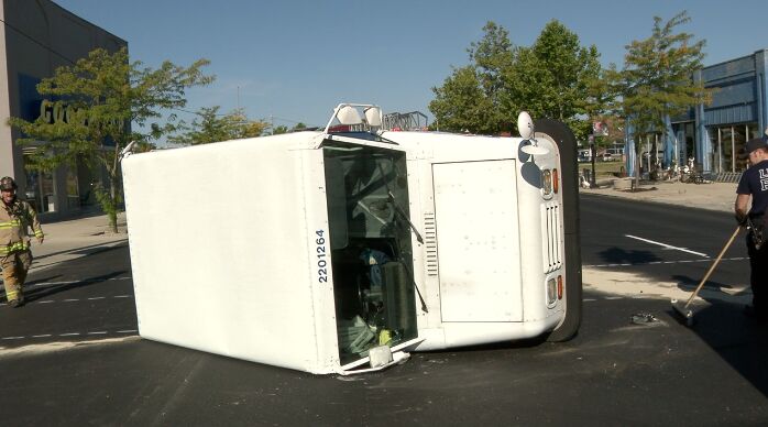 Lima Police Department investigating a crash that overturned a USPS mail truck