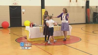 St. Charles School says goodbye to principal, priest