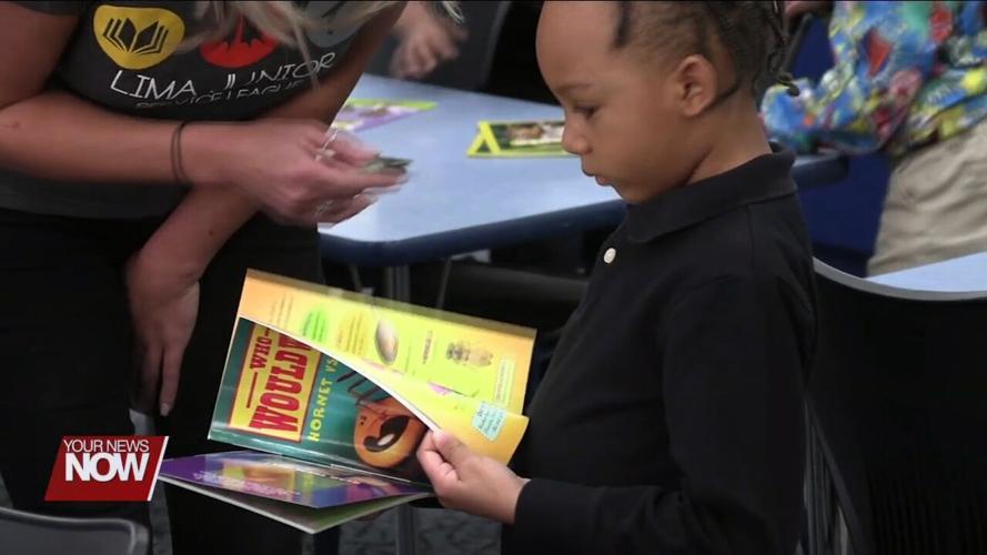 1st and 2nd graders at Lima City Schools get to a free book thanks to Lima Junior Service League