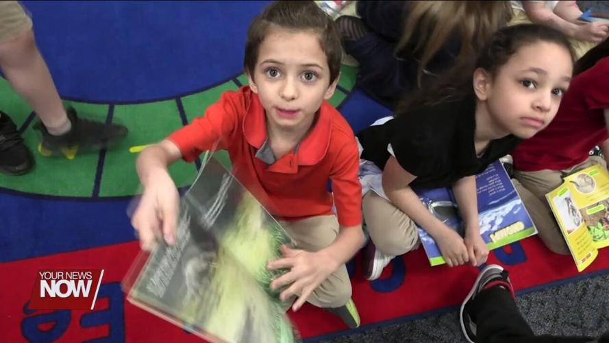 1st and 2nd graders at Lima City Schools get to a free book thanks to Lima Junior Service League