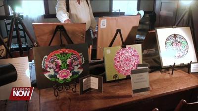 Swiss Community Historical Society shares centuries-old paper craft art of Scherenschnitte