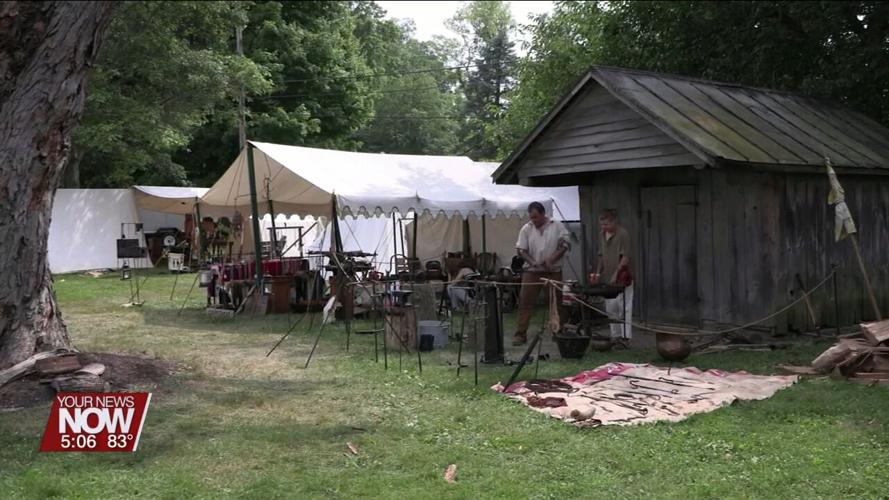 Historical reenactors set up camp at the Auglaize County Fair to offer an interactive view into the county's past