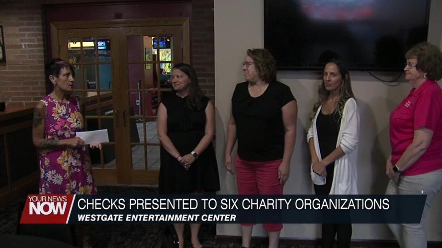 Checks presented to six local charities thanks to 2022 Charity Car Show