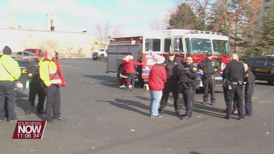 Lima students surprised with gifts and more from Santa and the Fraternal Order of Police