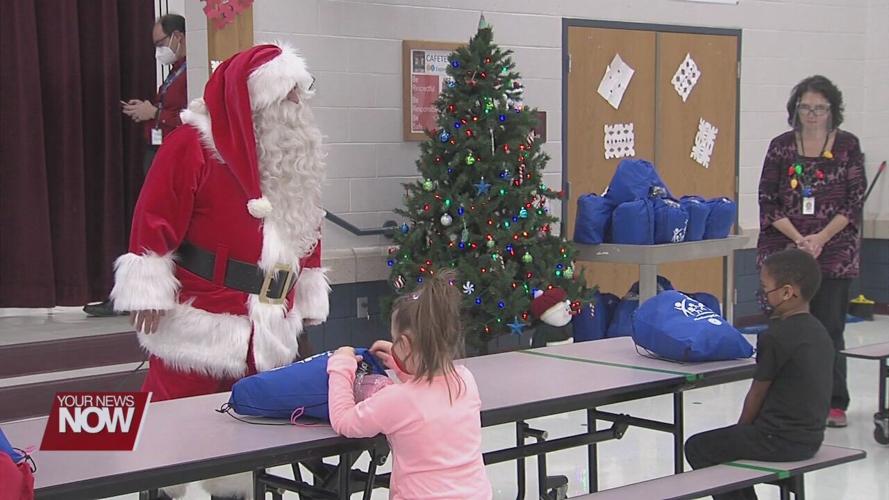 Lima Exchange Club socially distance surprises students with gifts and Santa