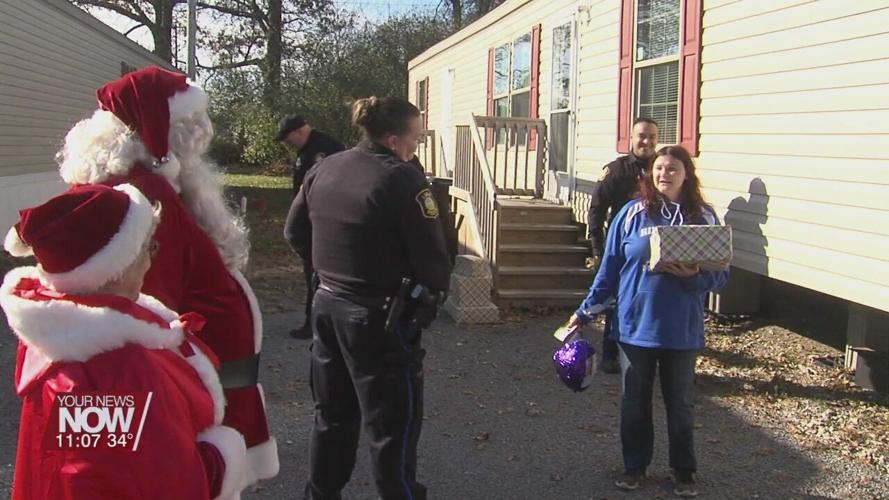 Lima students surprised with gifts and more from Santa and the Fraternal Order of Police