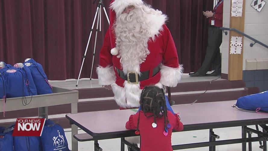 Lima Exchange Club socially distance surprises students with gifts and Santa