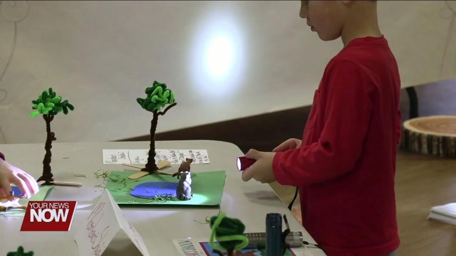 Kids in the JAMPD Nature Pals program explore the science behind the eclipse