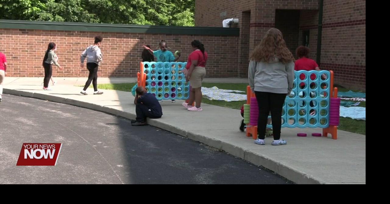 Students taking part in the Sparty Friends program say farewell to each