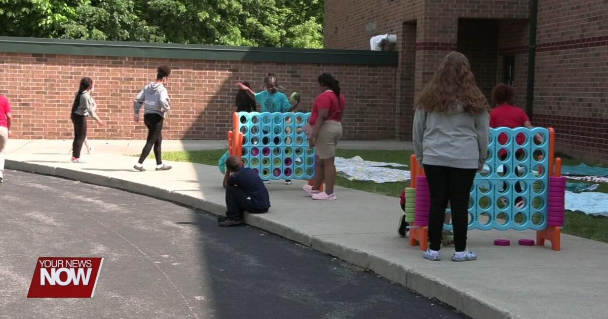 Students taking part in the Sparty Friends program say farewell to each