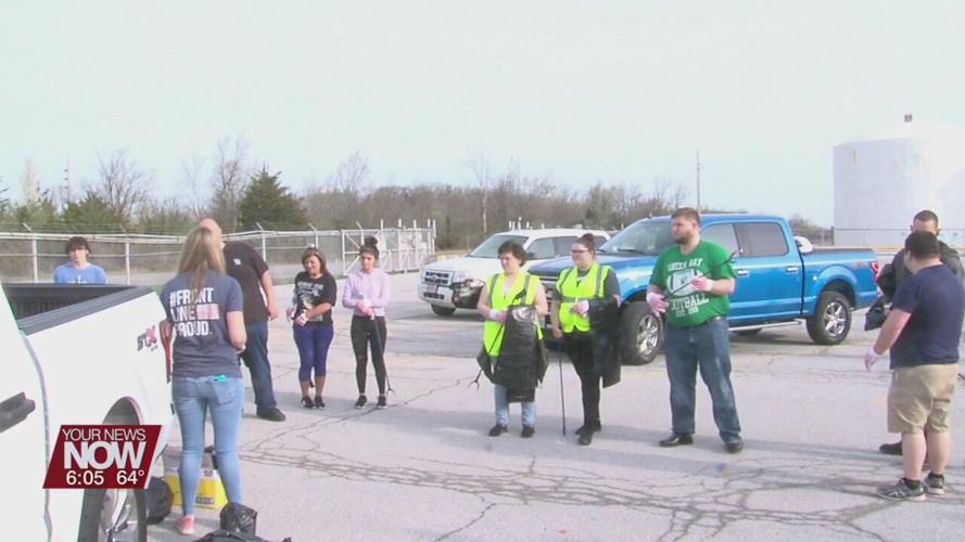 Reineke Family Dealerships clean up part of Sugar Street Saturday morning