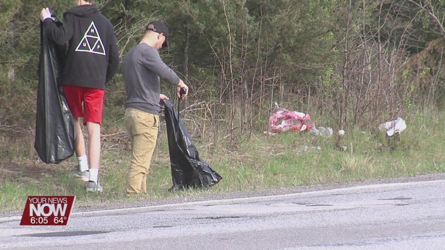Reineke Family Dealerships clean up part of Sugar Street Saturday morning