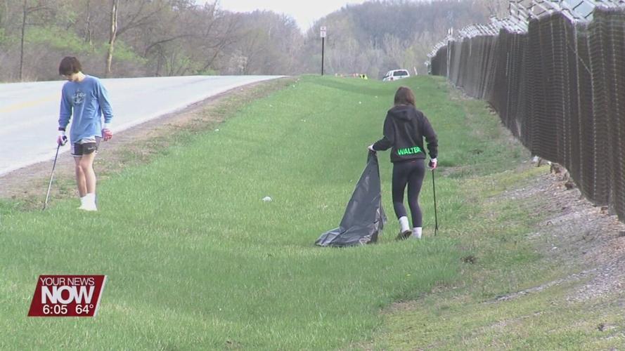Reineke Family Dealerships clean up part of Sugar Street Saturday morning