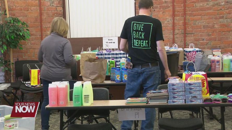 Backpacks filled with multiple items to be given to children entering foster care