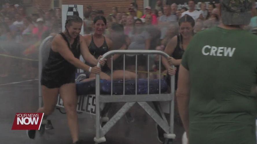 Racing in hospital beds for a good cause at the Moon Fest